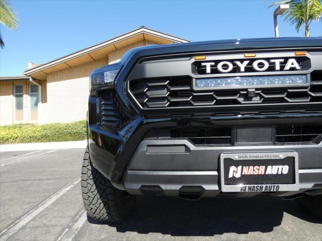 used 2024 Toyota Tacoma car, priced at $37,990