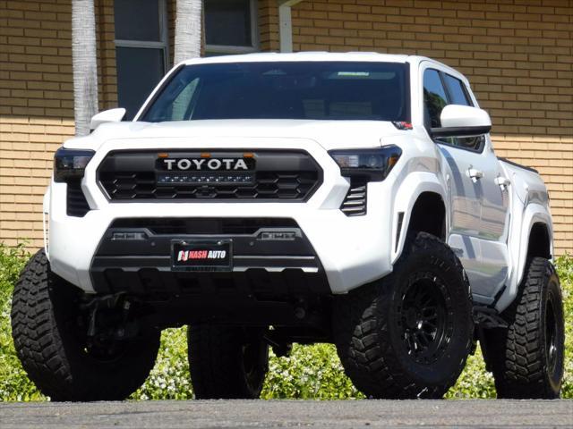 used 2024 Toyota Tacoma car, priced at $44,990