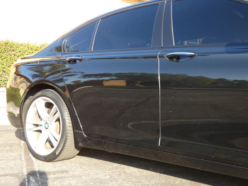 used 2014 BMW 750 car, priced at $14,990