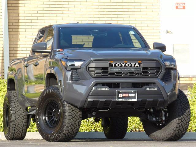 used 2024 Toyota Tacoma car, priced at $45,990