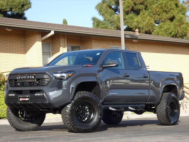 used 2024 Toyota Tacoma car, priced at $45,990
