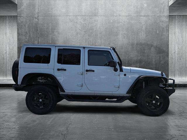 used 2015 Jeep Wrangler Unlimited car, priced at $19,952