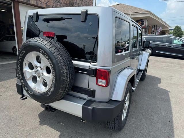 used 2014 Jeep Wrangler Unlimited car, priced at $16,995