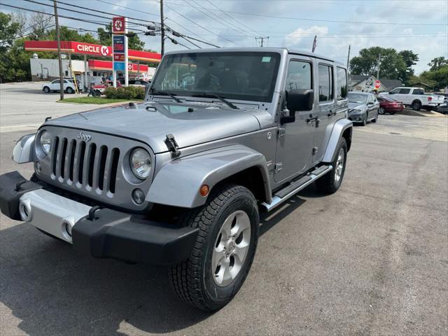 used 2014 Jeep Wrangler Unlimited car, priced at $16,995