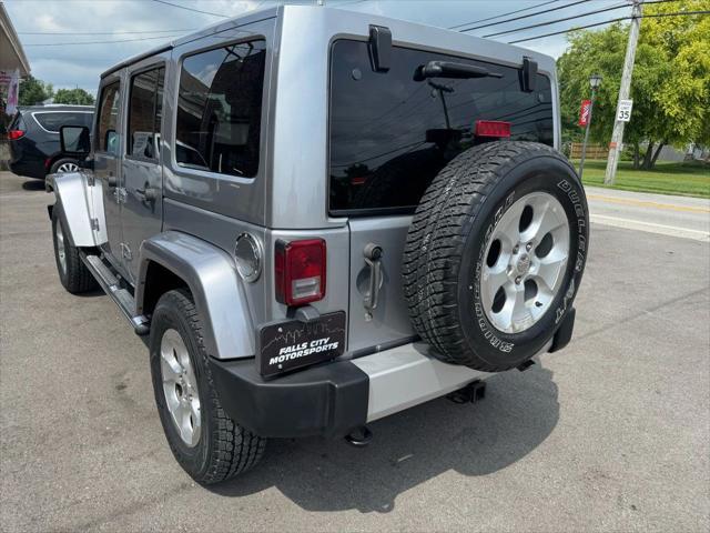 used 2014 Jeep Wrangler Unlimited car, priced at $16,995