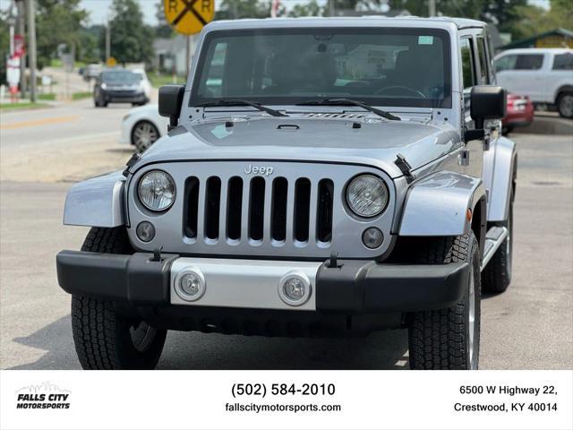 used 2014 Jeep Wrangler Unlimited car, priced at $16,995