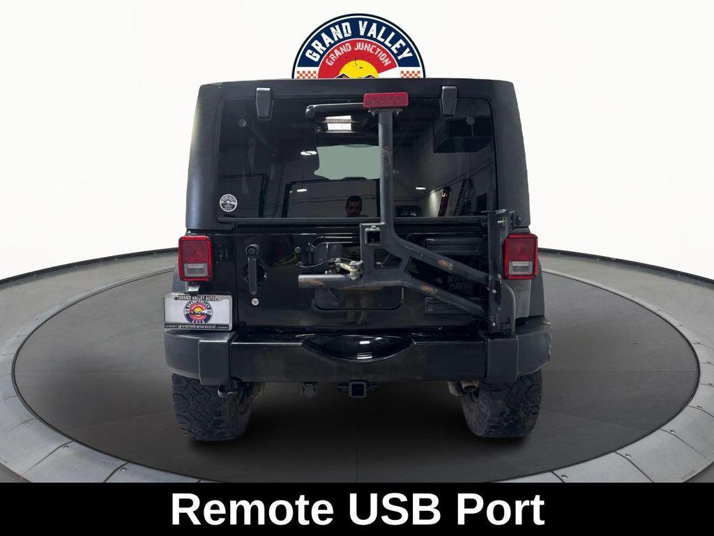 used 2014 Jeep Wrangler Unlimited car, priced at $19,688