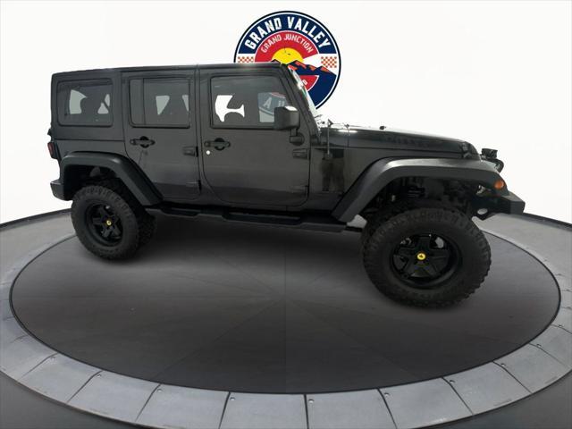 used 2014 Jeep Wrangler Unlimited car, priced at $19,988