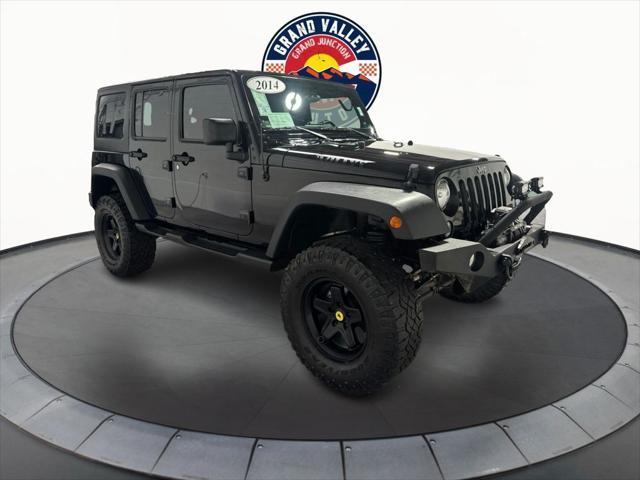 used 2014 Jeep Wrangler Unlimited car, priced at $19,988