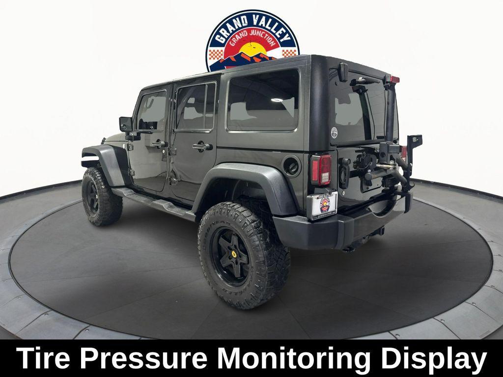 used 2014 Jeep Wrangler Unlimited car, priced at $19,688