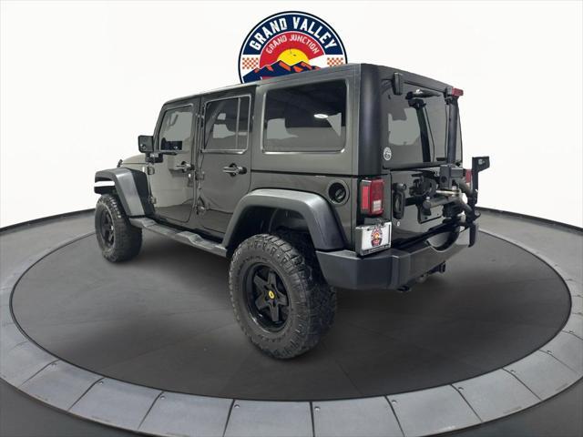 used 2014 Jeep Wrangler Unlimited car, priced at $19,988