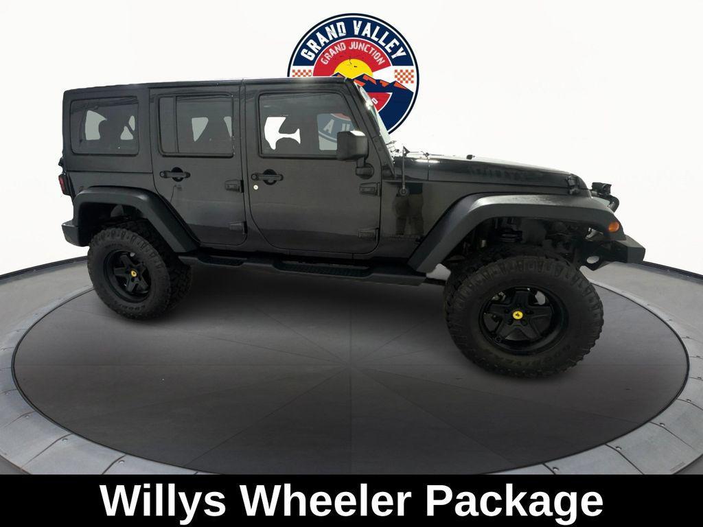 used 2014 Jeep Wrangler Unlimited car, priced at $19,688