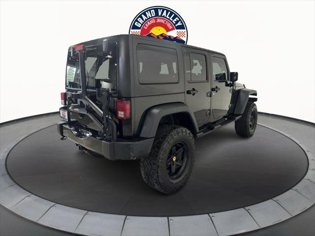 used 2014 Jeep Wrangler Unlimited car, priced at $19,988