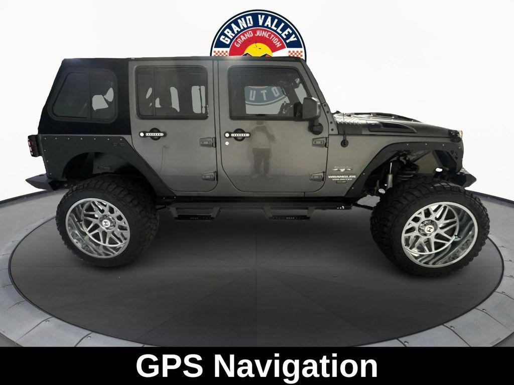 used 2016 Jeep Wrangler Unlimited car, priced at $24,688