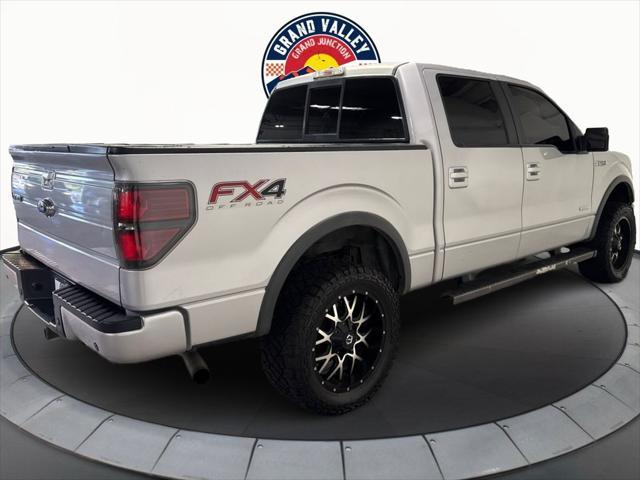 used 2014 Ford F-150 car, priced at $23,988