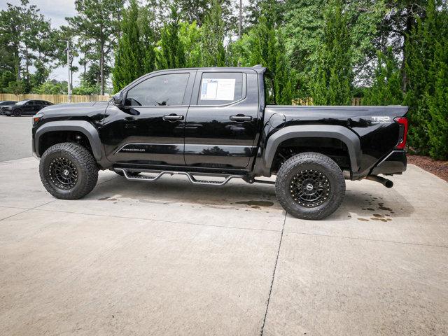 used 2024 Toyota Tacoma car, priced at $48,000