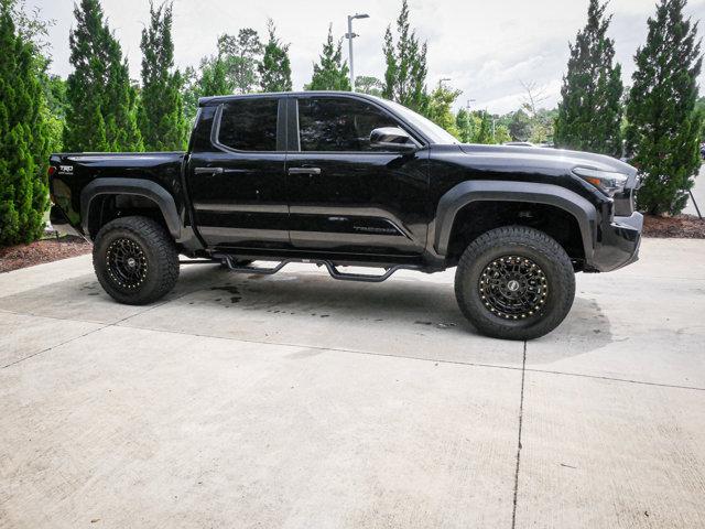 used 2024 Toyota Tacoma car, priced at $48,000
