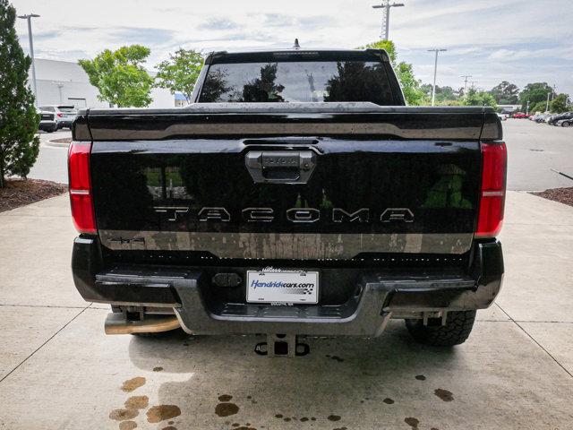 used 2024 Toyota Tacoma car, priced at $48,000
