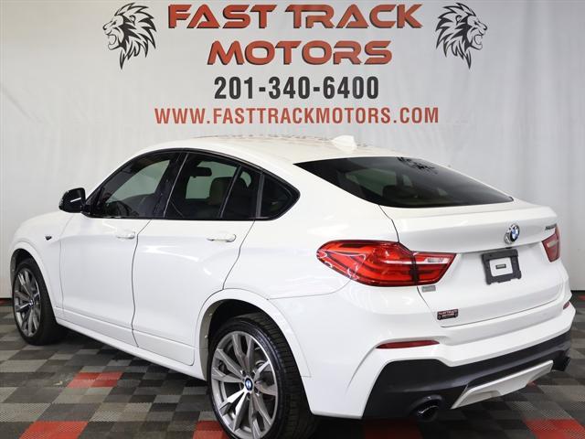 used 2016 BMW X4 car, priced at $16,985