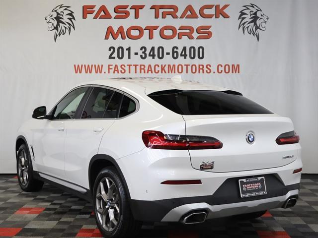 used 2022 BMW X4 car, priced at $27,885