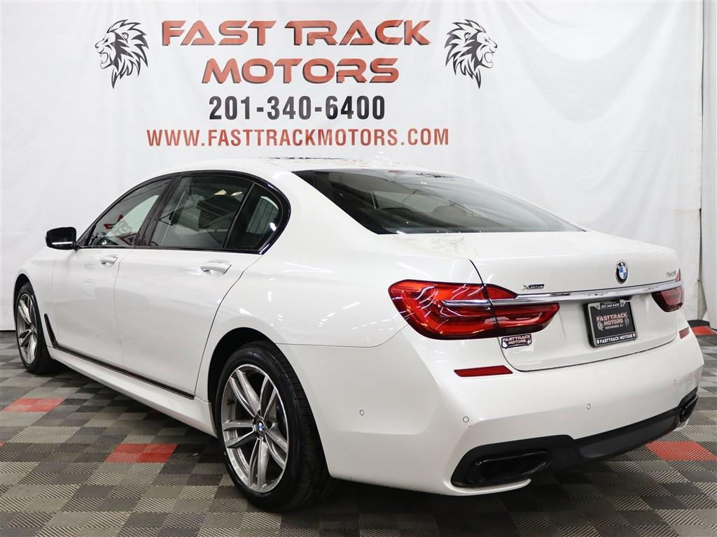 used 2016 BMW 750 car, priced at $17,985