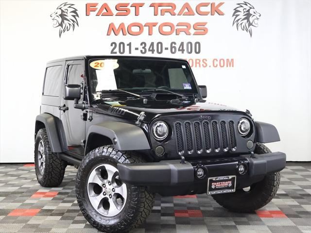 used 2015 Jeep Wrangler car, priced at $13,785