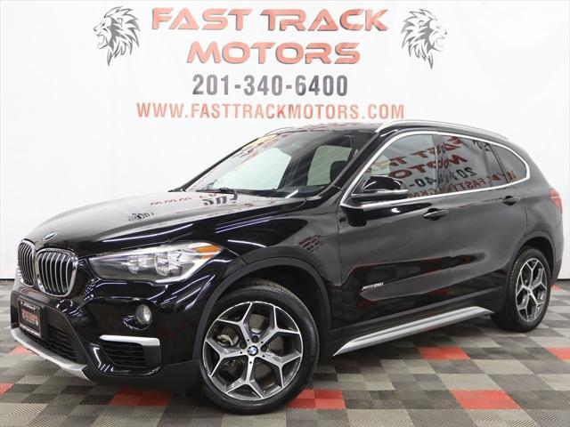 used 2018 BMW X1 car, priced at $13,985