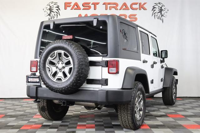 used 2015 Jeep Wrangler Unlimited car, priced at $21,695