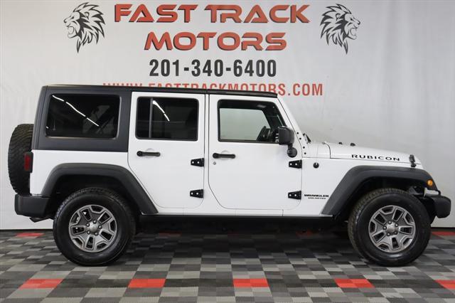 used 2015 Jeep Wrangler Unlimited car, priced at $21,785