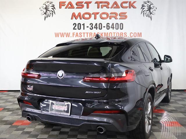 used 2021 BMW X4 car, priced at $25,985