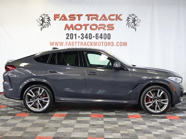 used 2022 BMW X6 car, priced at $52,785