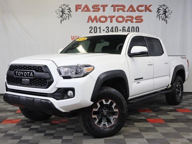 used 2018 Toyota Tacoma car, priced at $27,785