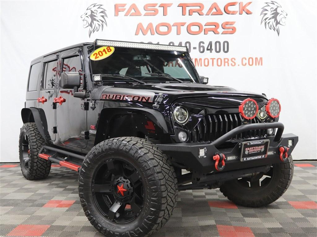 used 2018 Jeep Wrangler JK Unlimited car, priced at $25,985