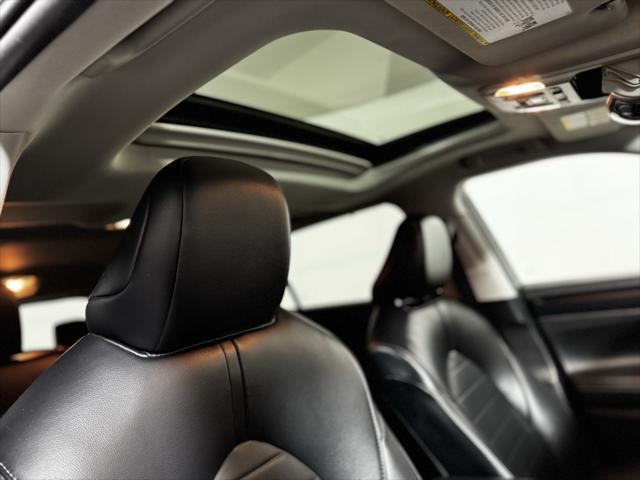 used 2022 Toyota Highlander Hybrid car, priced at $39,888