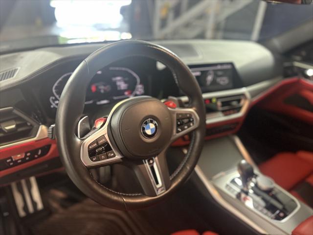 used 2023 BMW M4 car, priced at $74,301