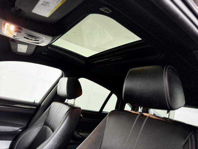 used 2016 BMW X4 car, priced at $16,800