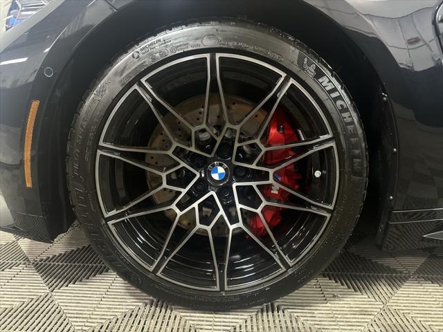 used 2024 BMW M4 car, priced at $79,499