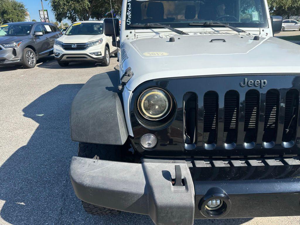 used 2015 Jeep Wrangler car, priced at $17,171