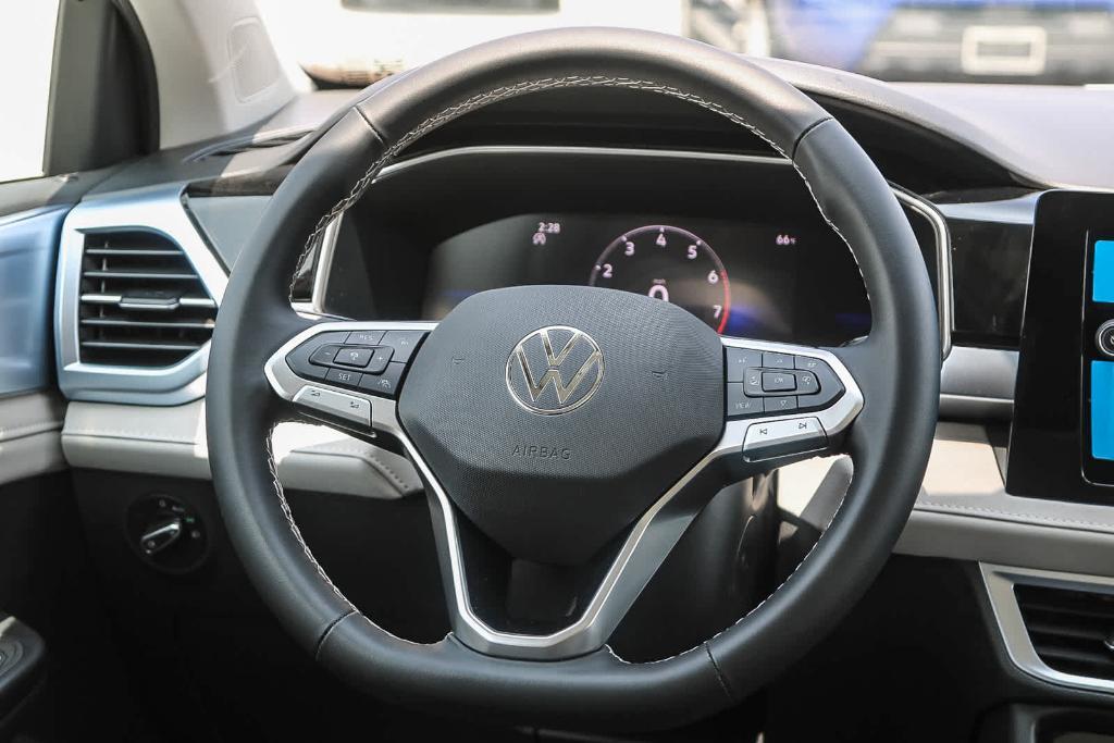 new 2025 Volkswagen Taos car, priced at $31,383