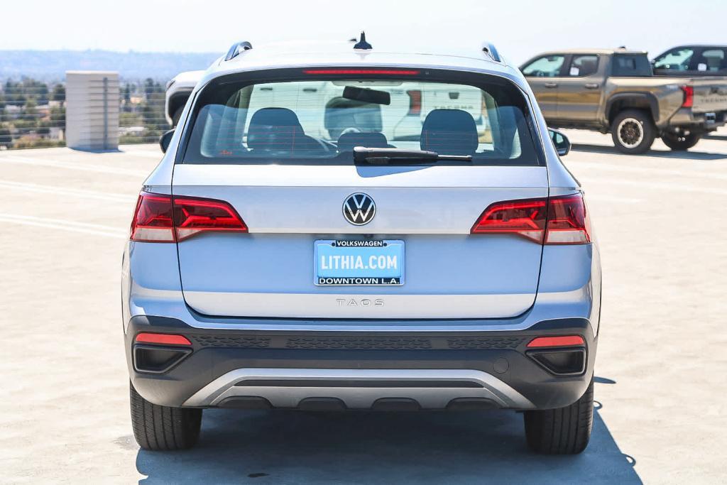used 2022 Volkswagen Taos car, priced at $18,785