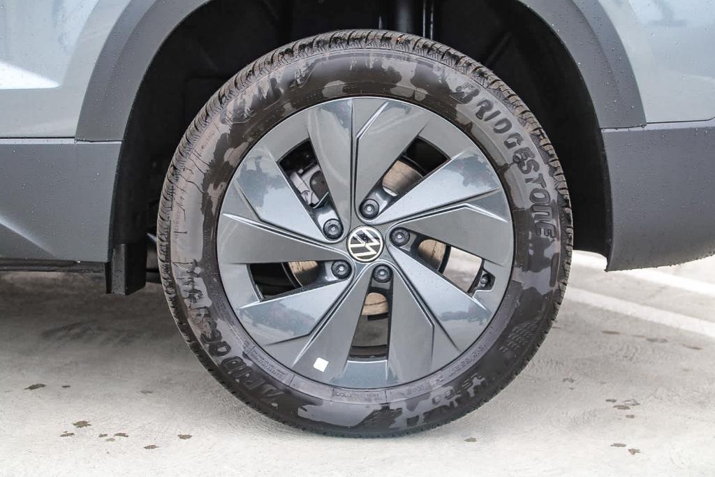new 2025 Volkswagen Taos car, priced at $27,011
