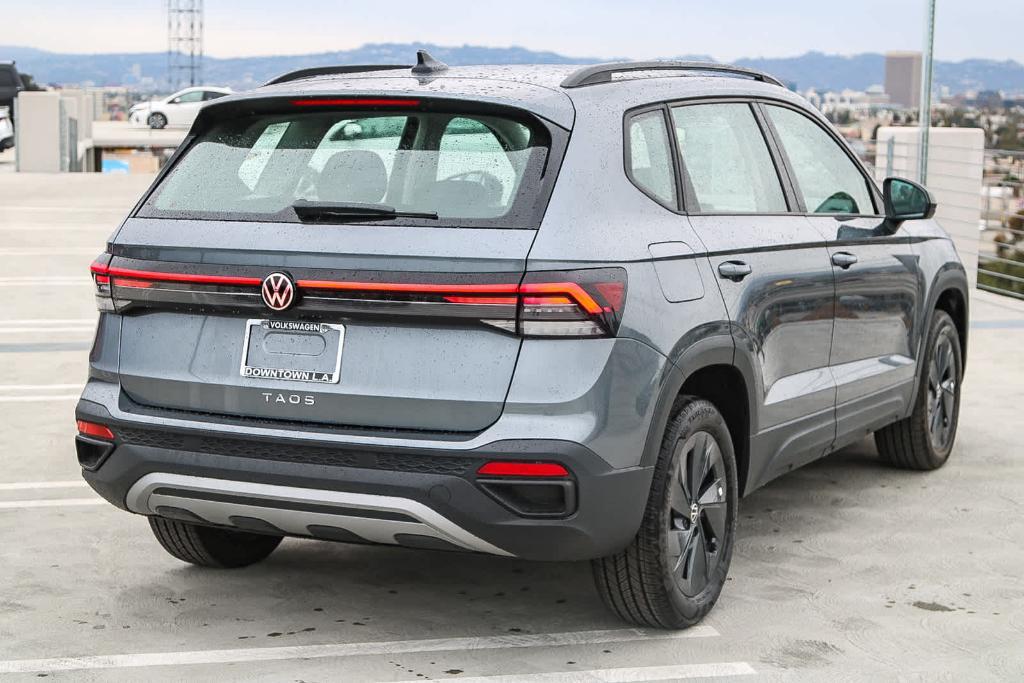 new 2025 Volkswagen Taos car, priced at $27,011
