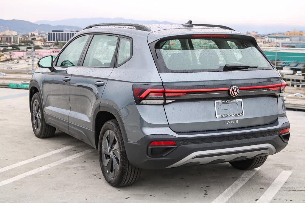 new 2025 Volkswagen Taos car, priced at $27,011