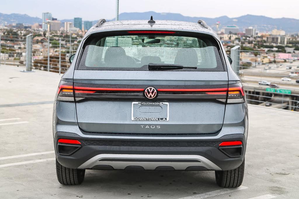 new 2025 Volkswagen Taos car, priced at $27,011