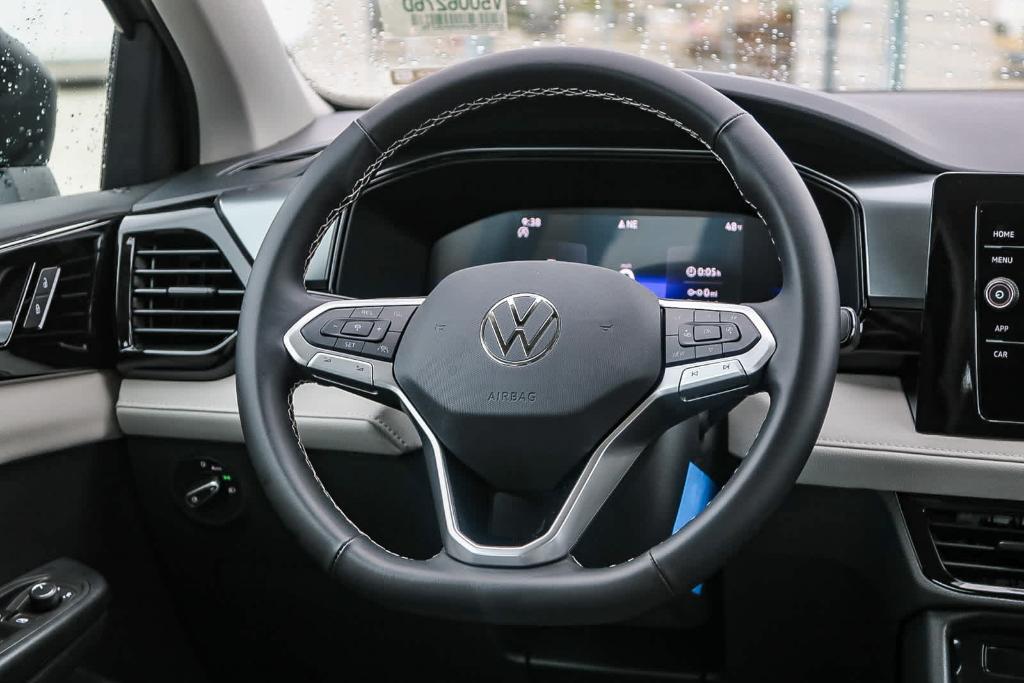 new 2025 Volkswagen Taos car, priced at $27,011