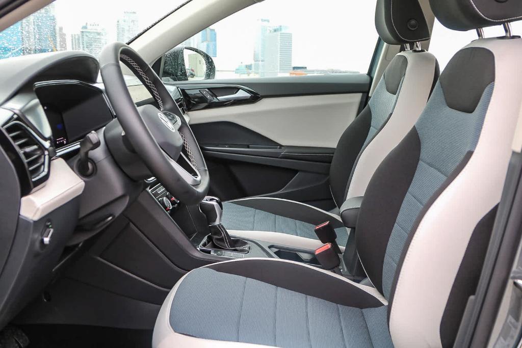 new 2025 Volkswagen Taos car, priced at $27,011
