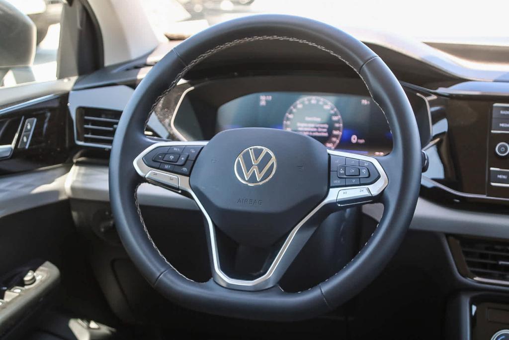 used 2024 Volkswagen Taos car, priced at $20,985