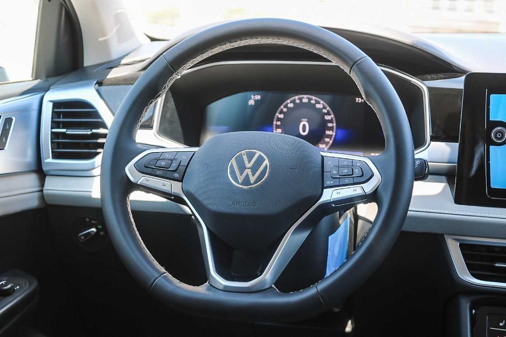 new 2025 Volkswagen Taos car, priced at $30,183