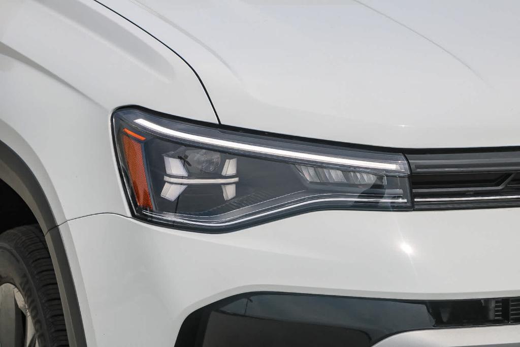 new 2025 Volkswagen Taos car, priced at $27,011