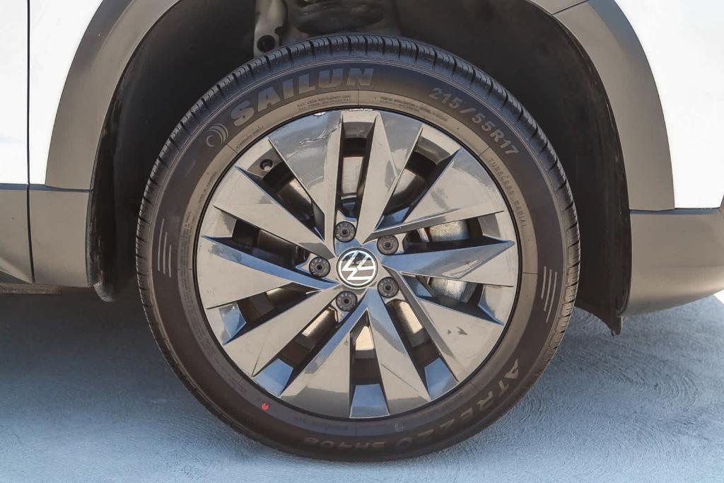 used 2023 Volkswagen Taos car, priced at $18,561